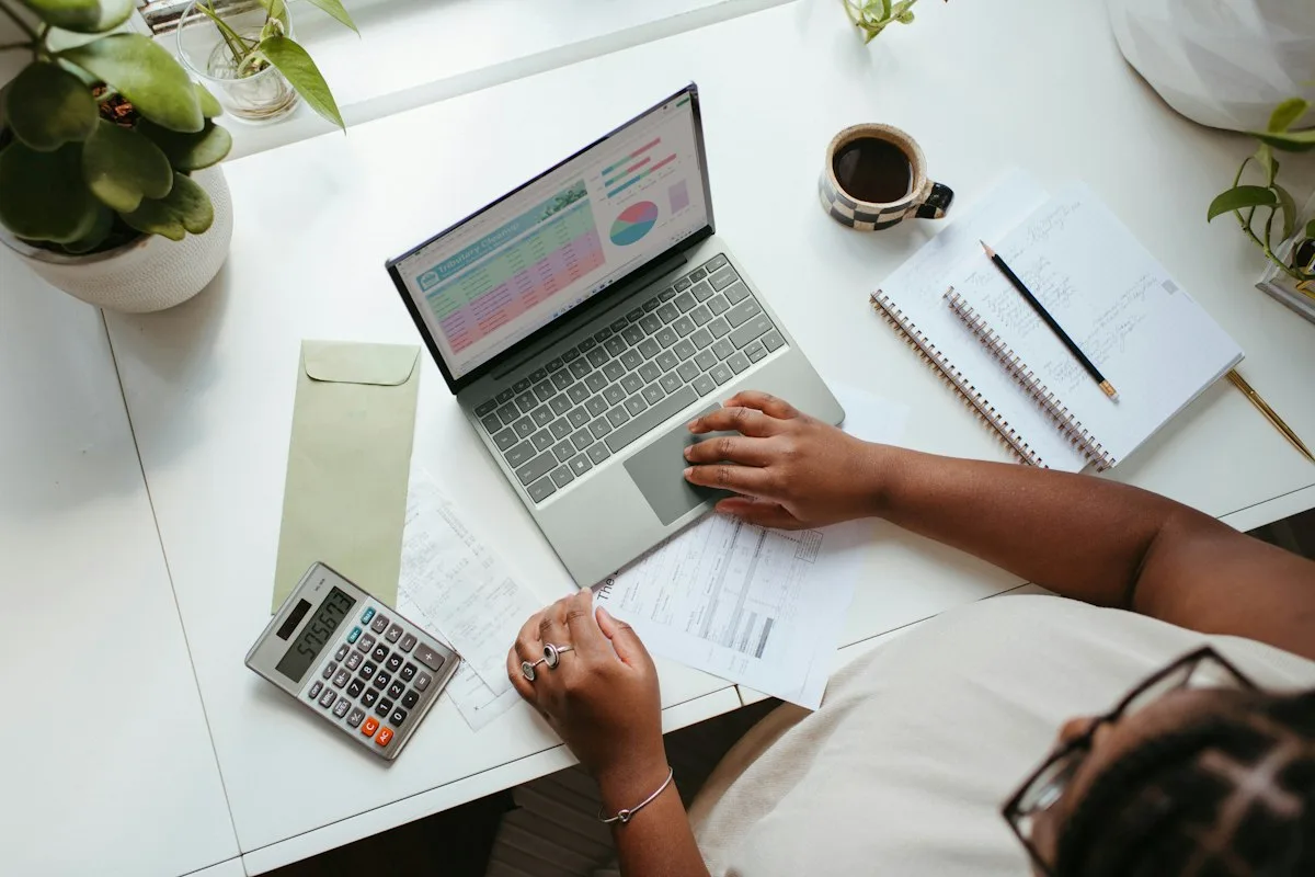 Creating local business content on laptop